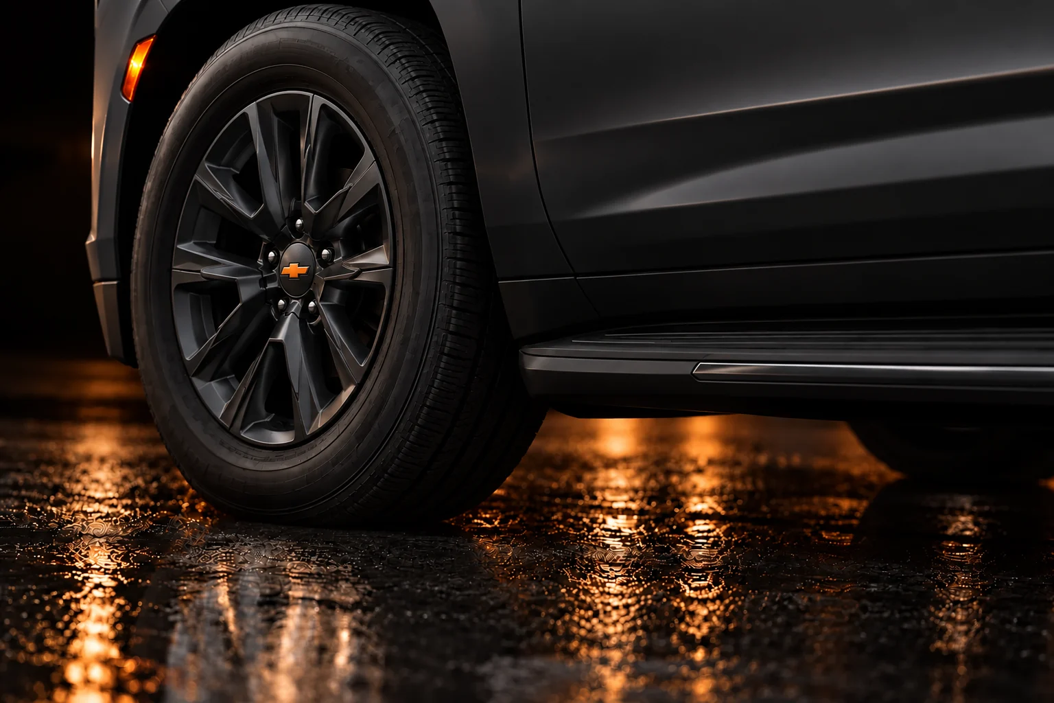 Matte-black Signature Premier wheel with orange Chevrolet emblem